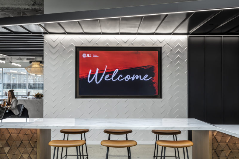 A Look Inside JLL’s Sleek New Irvine Office, INDesign Marketing Services